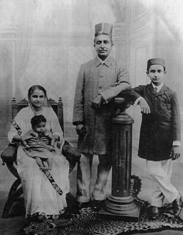 12 year old Phiroz Mehta with his parents and sister